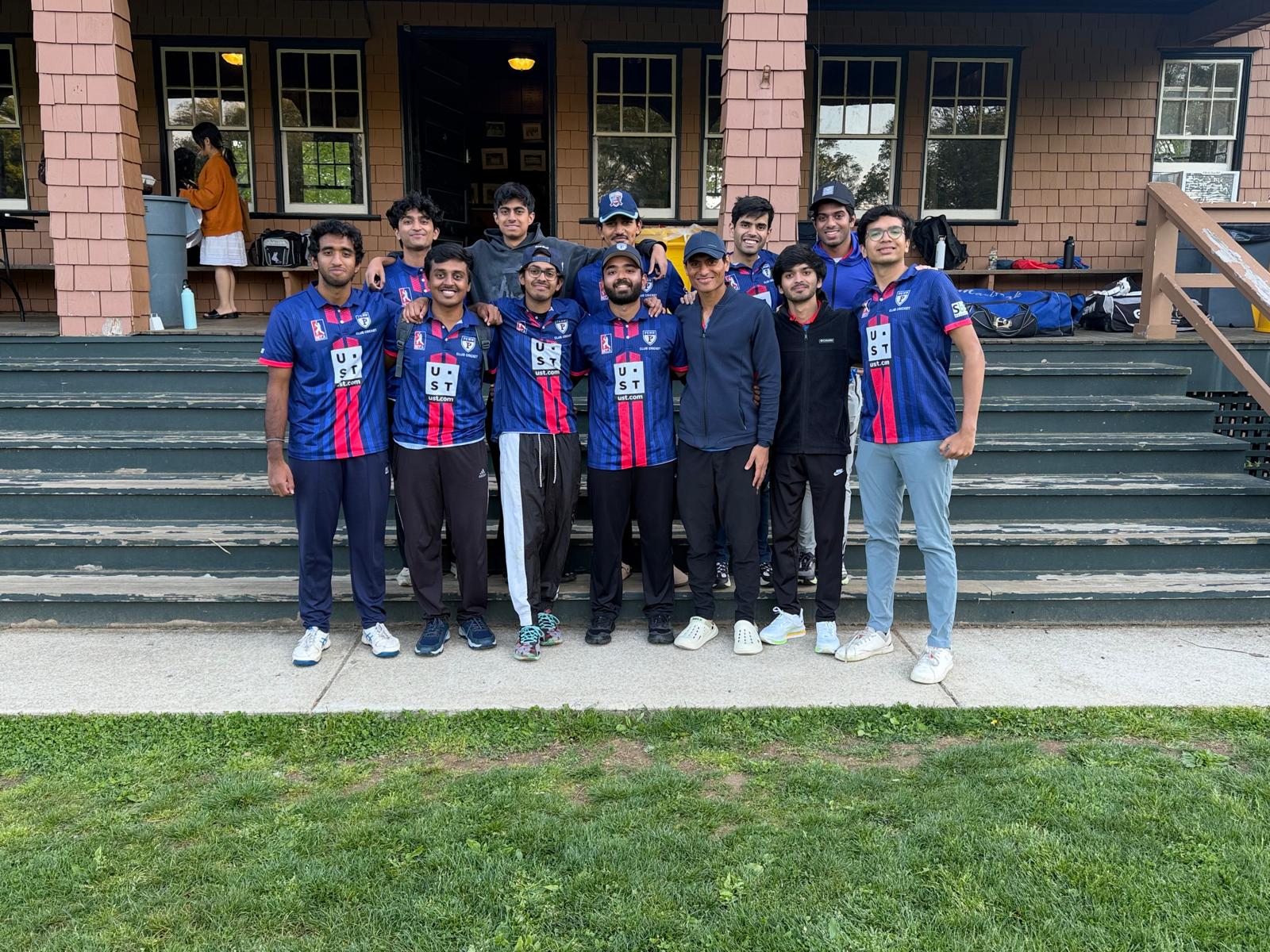 Penn Cricket Club team on the steps of the clubhouse